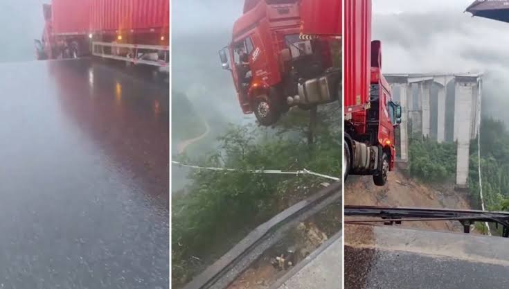China – Um caminhão ficou pendurado à beira de uma rodovia na província de Guizhou, após o desabamento de uma ponte provocado por fortesi do na chuvas nesta terça (24).